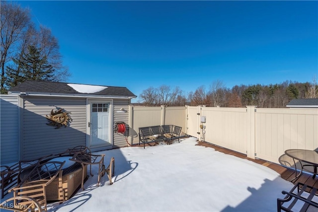 view of snow covered patio