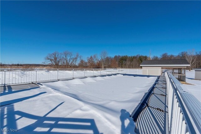 view of yard covered in snow