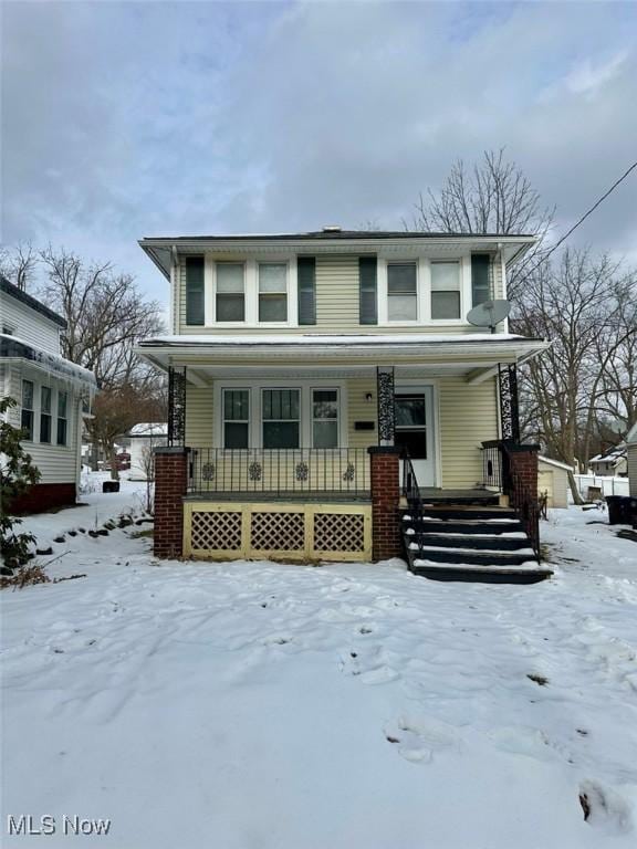 view of front of property featuring covered porch