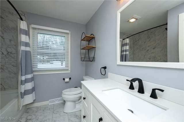 full bathroom with vanity, toilet, and shower / bath combo