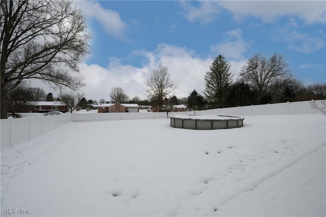 view of snowy yard