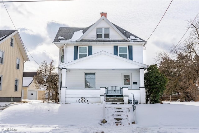 view of property featuring covered porch