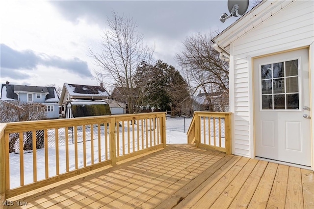 view of snow covered deck