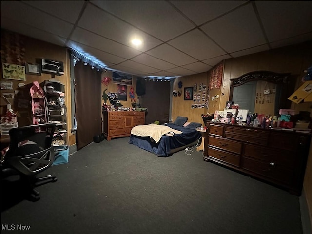 bedroom with a paneled ceiling