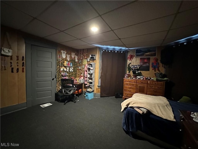 bedroom featuring a paneled ceiling