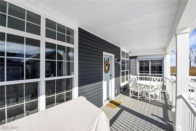 deck featuring covered porch