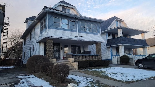 front of property featuring a porch