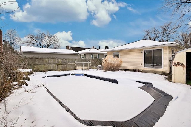 view of snow covered property