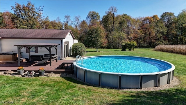 view of swimming pool featuring a gazebo, a deck, and a lawn