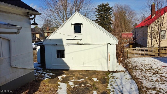 view of snow covered garage