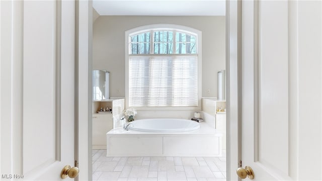 bathroom featuring a tub