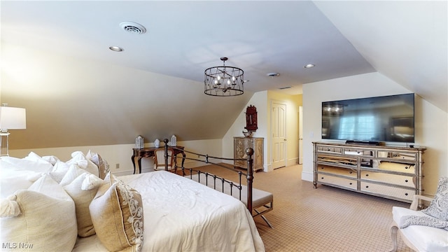 carpeted bedroom featuring vaulted ceiling and a notable chandelier