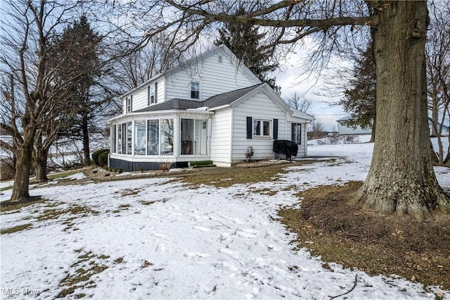 exterior space with a sunroom