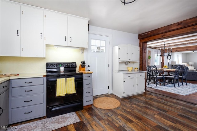 kitchen with white cabinetry, dark hardwood / wood-style flooring, black range with electric stovetop, and gray cabinets