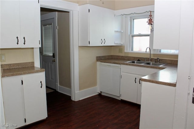 kitchen with sink, dark wood-type flooring, white cabinets, and white dishwasher