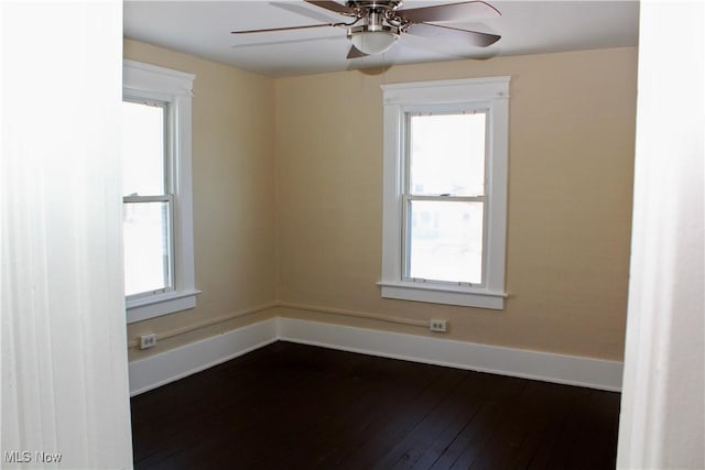 unfurnished room featuring hardwood / wood-style floors and ceiling fan