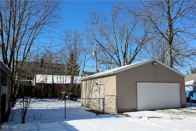 view of snow covered garage