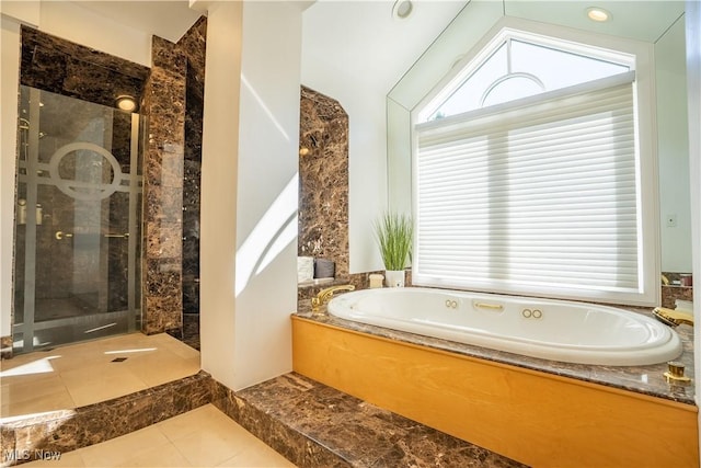 bathroom with independent shower and bath and vaulted ceiling