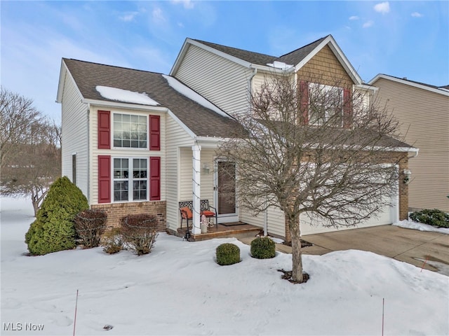 front of property with a garage