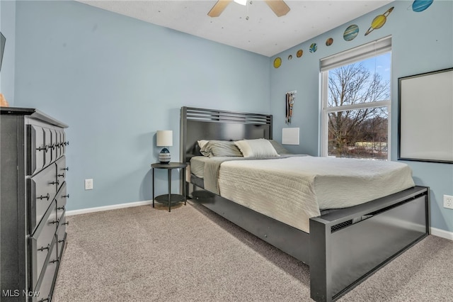 bedroom featuring ceiling fan and carpet flooring