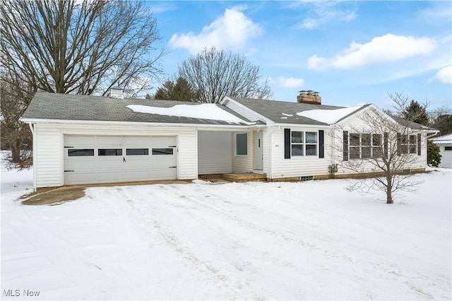 single story home featuring a garage