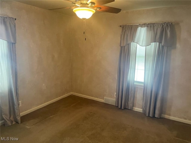 carpeted empty room with ceiling fan