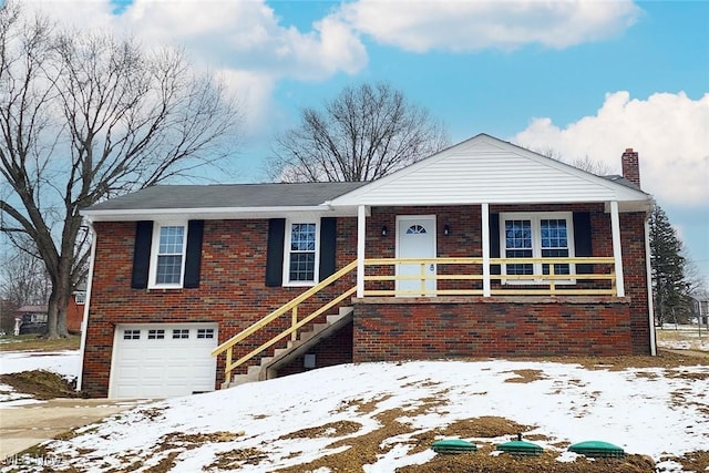 single story home featuring an attached garage, stairs, a chimney, and brick siding