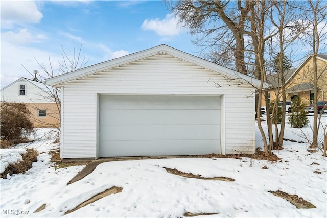 view of snow covered garage