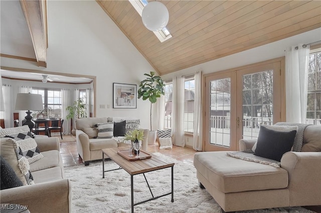 living room featuring french doors, light tile patterned flooring, wood ceiling, and a skylight