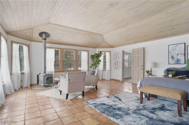 tiled bedroom featuring wood ceiling, lofted ceiling, and a wood stove