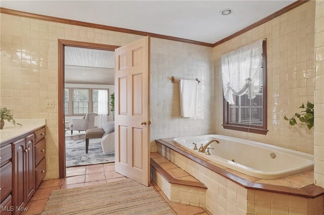 bathroom featuring vanity, ornamental molding, tile walls, and tile patterned floors