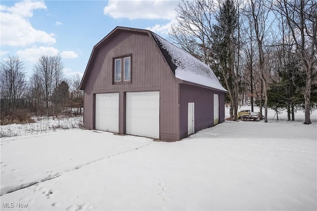 view of snow covered garage