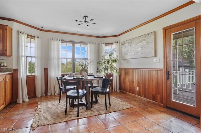 7750 W Calla Rd, Canfield, OH 44406 - dining space with wainscoting, ornamental molding, and wooden walls
