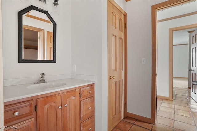 7750 W Calla Rd, Canfield, OH 44406 - bathroom with baseboards, tile patterned flooring, and vanity