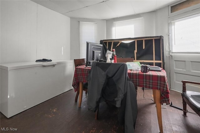 interior space featuring hardwood / wood-style flooring and plenty of natural light