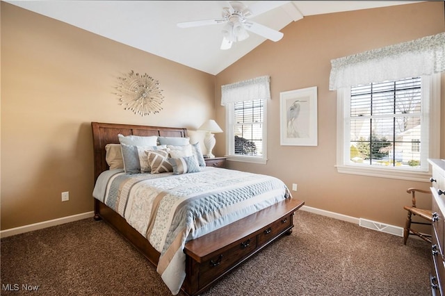 bedroom with lofted ceiling, dark carpet, and ceiling fan