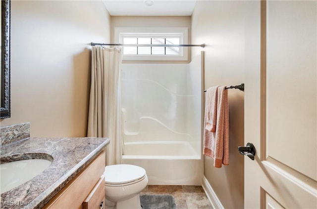 full bathroom featuring shower / tub combo, vanity, and toilet