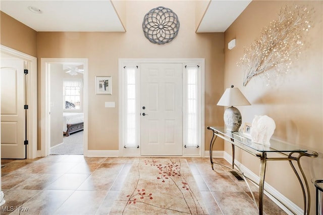 entrance foyer featuring light tile patterned flooring