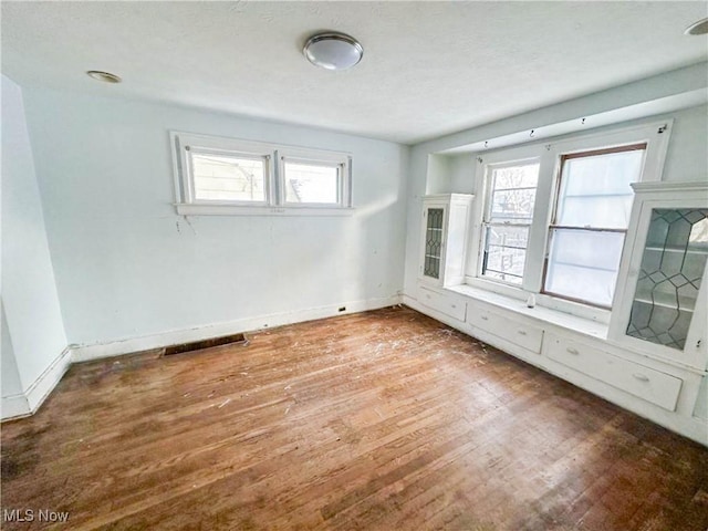 3235 W 94th St, Cleveland, OH 44102 - empty room featuring hardwood / wood-style floors and a wealth of natural light