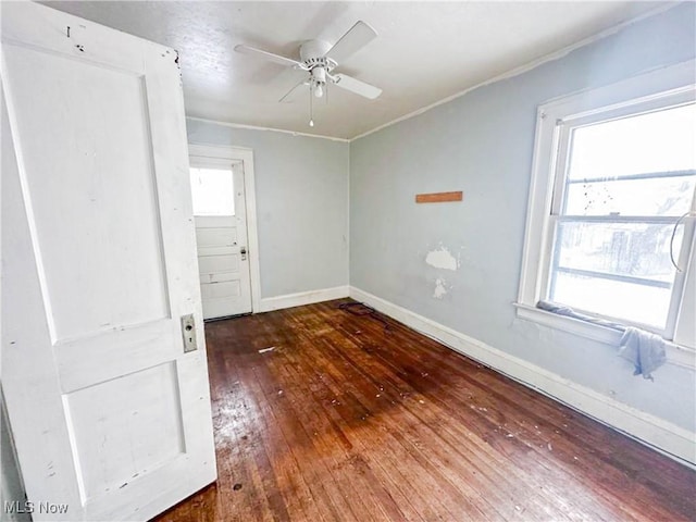 3235 W 94th St, Cleveland, OH 44102 - spare room featuring dark hardwood / wood-style floors and ceiling fan