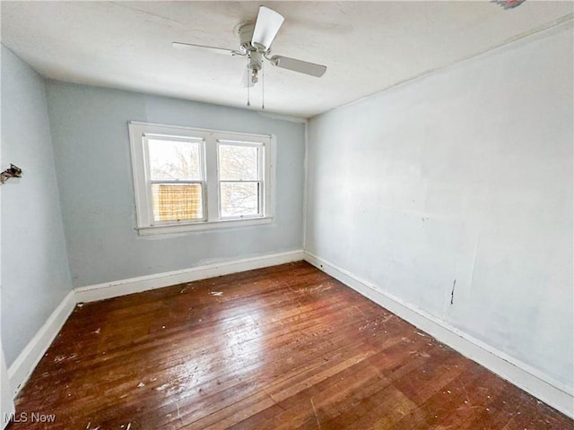 3235 W 94th St, Cleveland, OH 44102 - empty room featuring dark hardwood / wood-style flooring and ceiling fan