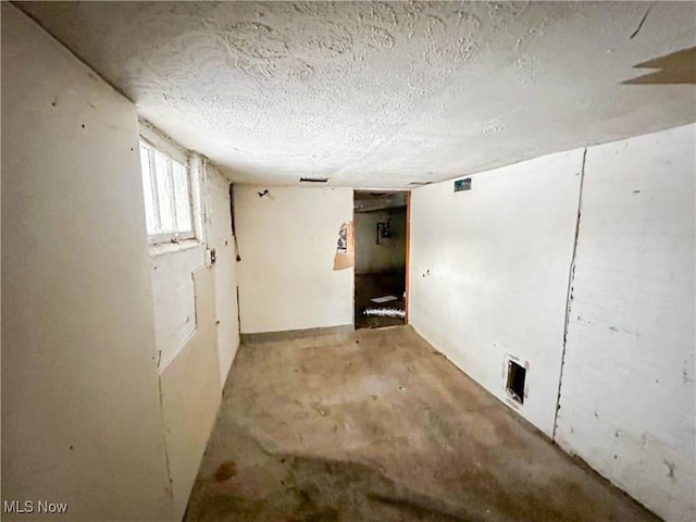 3235 W 94th St, Cleveland, OH 44102 - basement featuring a textured ceiling