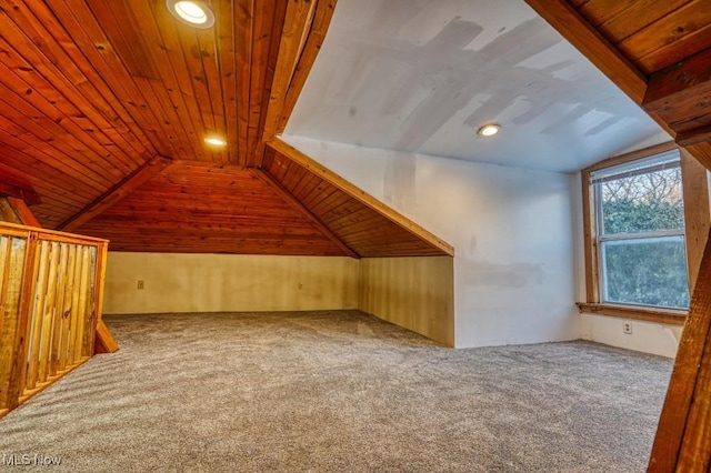 bonus room featuring wood ceiling, lofted ceiling, and carpet floors