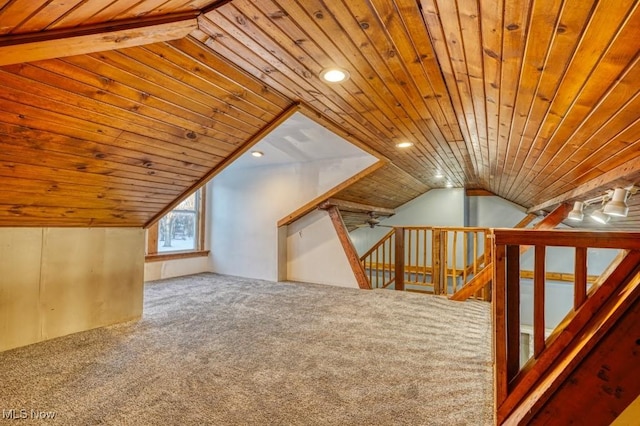 additional living space featuring wood ceiling, carpet floors, and vaulted ceiling