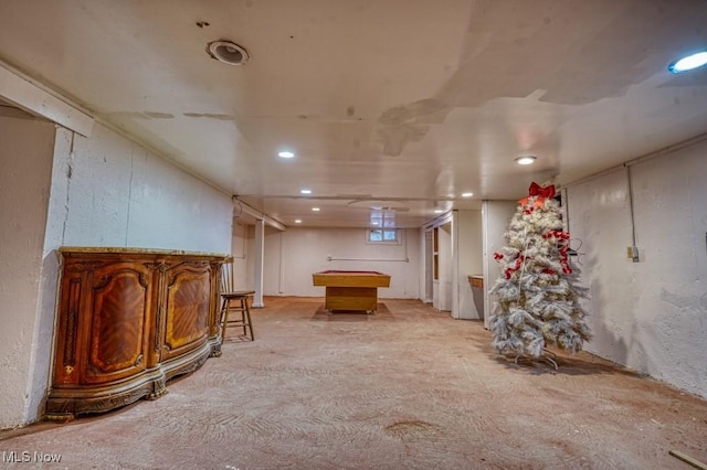 basement with light colored carpet and pool table