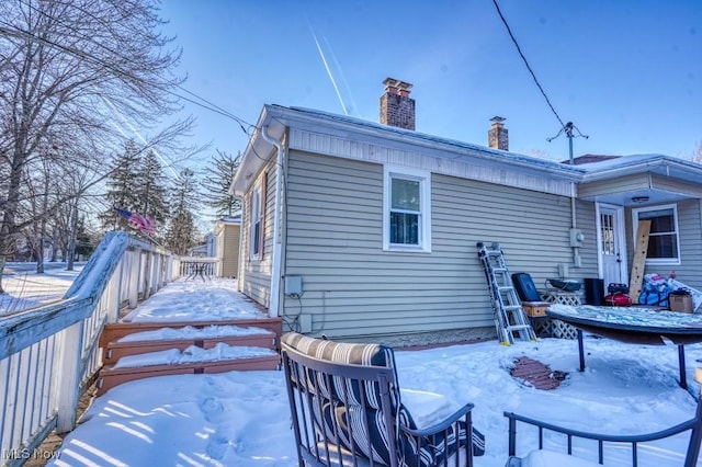 view of snow covered property