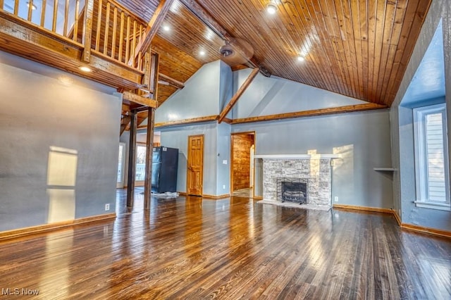 unfurnished living room featuring wood ceiling, a stone fireplace, wood-type flooring, and high vaulted ceiling