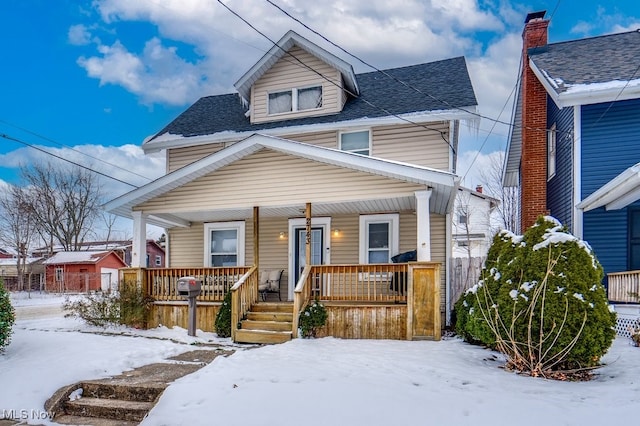 bungalow-style home with a porch