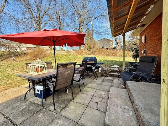 view of patio / terrace featuring grilling area and outdoor dining space