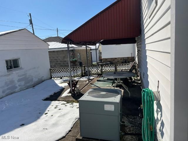 exterior space featuring a gazebo and central AC unit